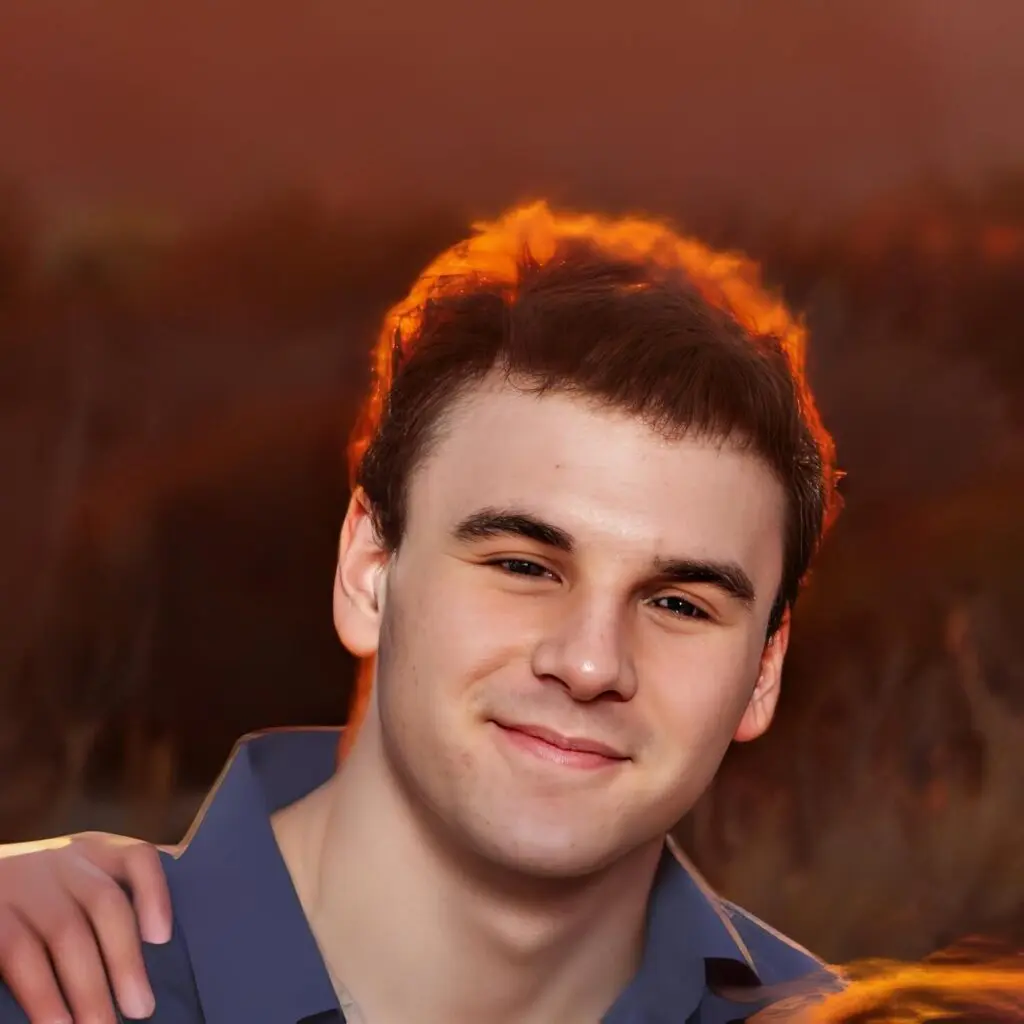 Smiling man with sunset background